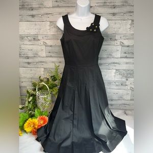 Calvin Klein sleeveless black dress. Fully lined jewel details size 4.